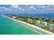 Aerial of beachfront properties and coastline at 675 Longboat Club Rd # 22A, Longboat Key, FL 34228