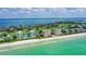 Aerial view of beachfront property and coastline at 675 Longboat Club Rd # 22A, Longboat Key, FL 34228