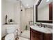 Spa-like bathroom with granite vanity and glass shower at 675 Longboat Club Rd # 22A, Longboat Key, FL 34228