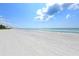 Stunning beach view with white sand and clear water at 675 Longboat Club Rd # 22A, Longboat Key, FL 34228