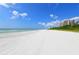 Beachfront view with white sand and blue water at 675 Longboat Club Rd # 22A, Longboat Key, FL 34228