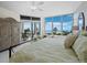 Main bedroom with ocean views and a king-size bed at 675 Longboat Club Rd # 22A, Longboat Key, FL 34228