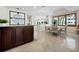 Bright breakfast nook with table and chairs near kitchen at 675 Longboat Club Rd # 22A, Longboat Key, FL 34228