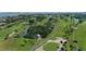 Aerial view of lush green golf course at 675 Longboat Club Rd # 22A, Longboat Key, FL 34228