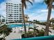 Inviting pool area with lounge chairs and ocean views at 675 Longboat Club Rd # 22A, Longboat Key, FL 34228