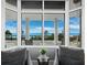 Peaceful sitting area with ocean views and comfortable chairs at 675 Longboat Club Rd # 22A, Longboat Key, FL 34228