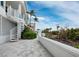 Exterior spiral staircase leading to ground level at 675 Longboat Club Rd # 22A, Longboat Key, FL 34228