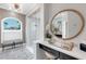 Vanity area with a large mirror and modern fixtures at 7117 River Club Blvd, Bradenton, FL 34202