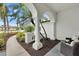 Landscaped walkway leading to front entrance with columns at 7117 River Club Blvd, Bradenton, FL 34202