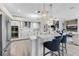 Modern kitchen featuring stainless steel appliances and white shaker cabinets at 7117 River Club Blvd, Bradenton, FL 34202