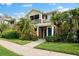 Two-story townhome with screened balcony and green door at 7417 Vista Way # 106, Bradenton, FL 34202