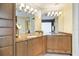 Elegant bathroom with double vanity, marble countertops, and large shower at 7716 Club Ln, Sarasota, FL 34238