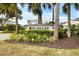 Community entrance sign, The Enclave, with landscaping at 7716 Club Ln, Sarasota, FL 34238