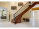 View of curved staircase and entryway at 7716 Club Ln, Sarasota, FL 34238