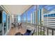 Enjoy the ocean view from this tiled balcony with cushioned seating at 800 Benjamin Franklin Dr # 602, Sarasota, FL 34236