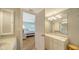 Clean bathroom with white vanity and a shower/tub combo at 800 Benjamin Franklin Dr # 602, Sarasota, FL 34236