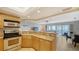 Well-equipped kitchen with granite countertops and ample cabinetry at 800 Benjamin Franklin Dr # 602, Sarasota, FL 34236