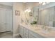 Elegant bathroom with double vanity, quartz countertops, and large shower at 8052 Grande Shores Dr, Sarasota, FL 34240