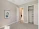 Empty bedroom with closet and neutral wall paint at 8052 Grande Shores Dr, Sarasota, FL 34240