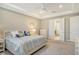 Spacious bedroom with ensuite bathroom access and large bed at 8052 Grande Shores Dr, Sarasota, FL 34240