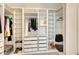 Large walk-in closet with ample shelving and hanging space at 8052 Grande Shores Dr, Sarasota, FL 34240