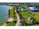 Enjoy lakefront walkways and lawn games at 8052 Grande Shores Dr, Sarasota, FL 34240