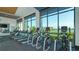 Fitness center with cardio equipment and lake views at 8052 Grande Shores Dr, Sarasota, FL 34240