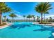 Resort-style pool with ample deck space and lake views at 8052 Grande Shores Dr, Sarasota, FL 34240