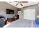 Comfortable bedroom with a king-size bed, a large closet, and a TV at 8628 Woodbriar Dr, Sarasota, FL 34238