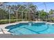 Relaxing pool and spa with screened enclosure at 8628 Woodbriar Dr, Sarasota, FL 34238