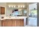 Double vanity bathroom with access to the screened patio at 8752 Monterey Bay Loop, Bradenton, FL 34212