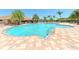 Relaxing freeform community pool with patio at 8752 Monterey Bay Loop, Bradenton, FL 34212