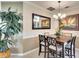 Casual dining area with a square table and four chairs at 8752 Monterey Bay Loop, Bradenton, FL 34212