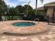 Relaxing community hot tub with surrounding patio at 8752 Monterey Bay Loop, Bradenton, FL 34212