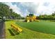 playground with slides, climbing structures, and a soft surface at 8752 Monterey Bay Loop, Bradenton, FL 34212