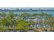 Scenic waterfront view with lush landscaping and boats at 101 S Gulfstream Ave # 8G, Sarasota, FL 34236