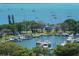 Aerial view of a marina with boats and waterfront property at 101 S Gulfstream Ave # 8G, Sarasota, FL 34236