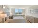 Spacious bedroom with hardwood floors, neutral decor and bay views at 101 S Gulfstream Ave # 8G, Sarasota, FL 34236