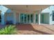 Condominium building entrance with modern design and brick walkway at 101 S Gulfstream Ave # 8G, Sarasota, FL 34236