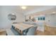 Modern dining area with marble table and comfortable seating at 101 S Gulfstream Ave # 8G, Sarasota, FL 34236