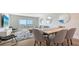 Bright and airy living room with hardwood floors and water views at 101 S Gulfstream Ave # 8G, Sarasota, FL 34236
