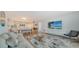 Open concept living room and dining area with modern decor at 101 S Gulfstream Ave # 8G, Sarasota, FL 34236