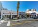 Street view of upscale shops and boutiques in a city at 101 S Gulfstream Ave # 8G, Sarasota, FL 34236