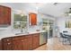 Kitchen boasts modern countertops and stainless steel dishwasher at 1040 Acadia Rd, Venice, FL 34293