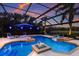 Relaxing pool and spa area with fire features at 10619 Restoration Ter, Bradenton, FL 34212