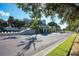 Gated community entrance with water feature at 115 Grand Oak Cir, Venice, FL 34292