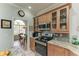 Eat-in kitchen with stainless steel appliances and granite countertops at 115 Grand Oak Cir, Venice, FL 34292