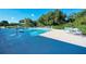 Refreshing community swimming pool with lounge chairs at 115 Grand Oak Cir, Venice, FL 34292