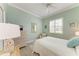 Cozy bedroom with a full-size bed and light walls at 120 Grand Oak Cir, Venice, FL 34292