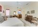 Bright bedroom with a king-size bed and ample natural light at 120 Grand Oak Cir, Venice, FL 34292